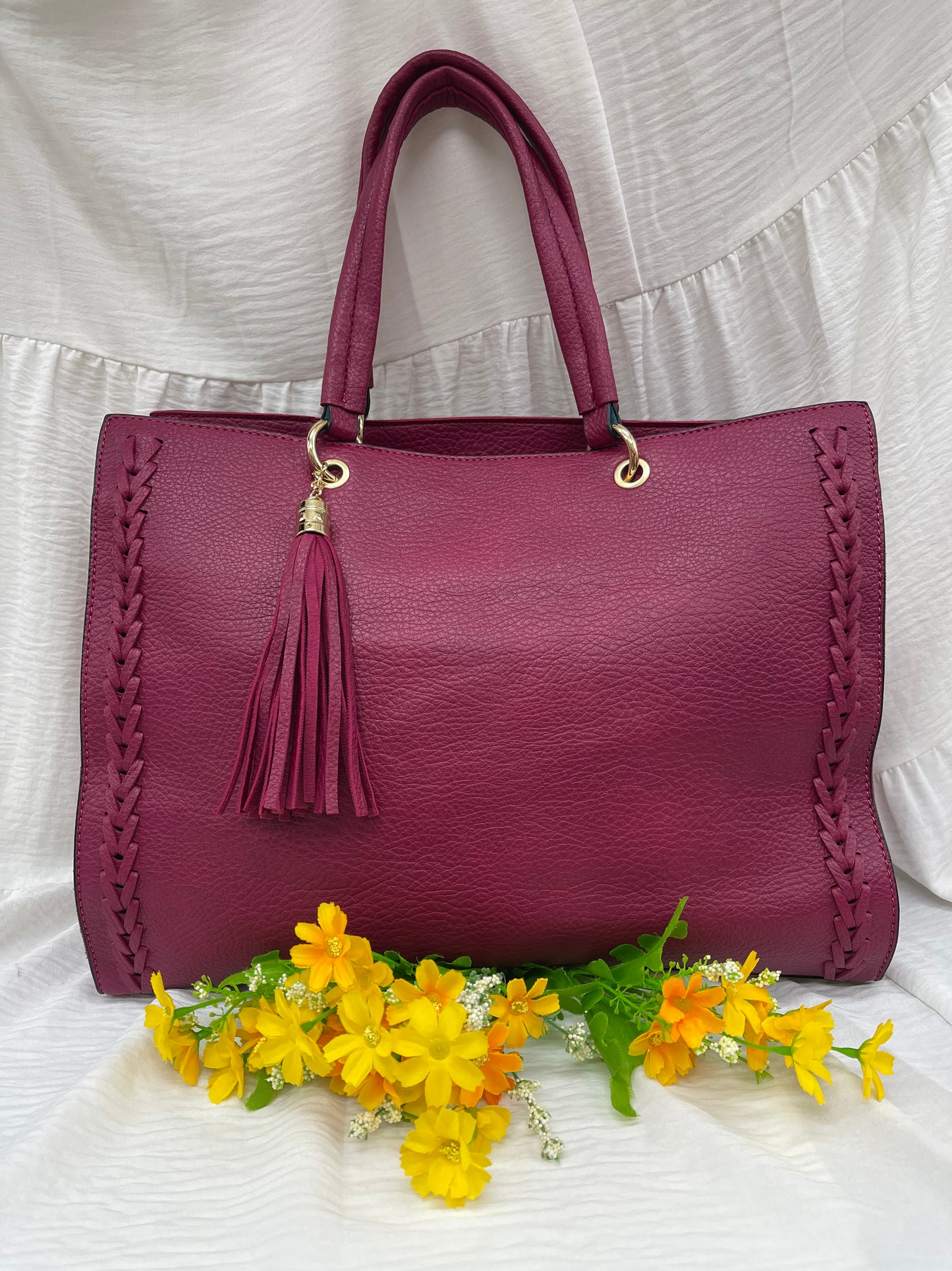 Sac à main texturé bordeaux avec détails tressés - Raffinement intemporel